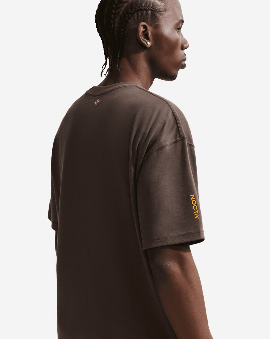 Shop Nike NOCTA T-Shirt IB5673-237 brown | SNIPES USA