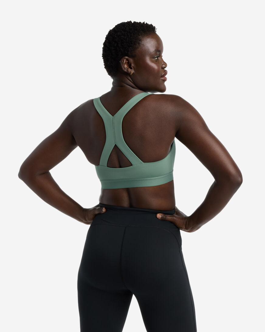 Shop New Balance NB Essential Train Bra WB51035_DKJ green | SNIPES USA
