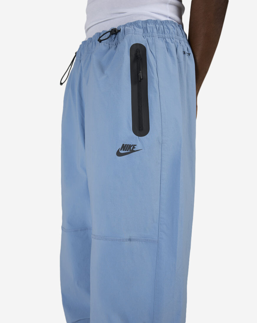Shop Nike Tech Dri-FIT Woven Pants IU6966-486 blue | SNIPES USA