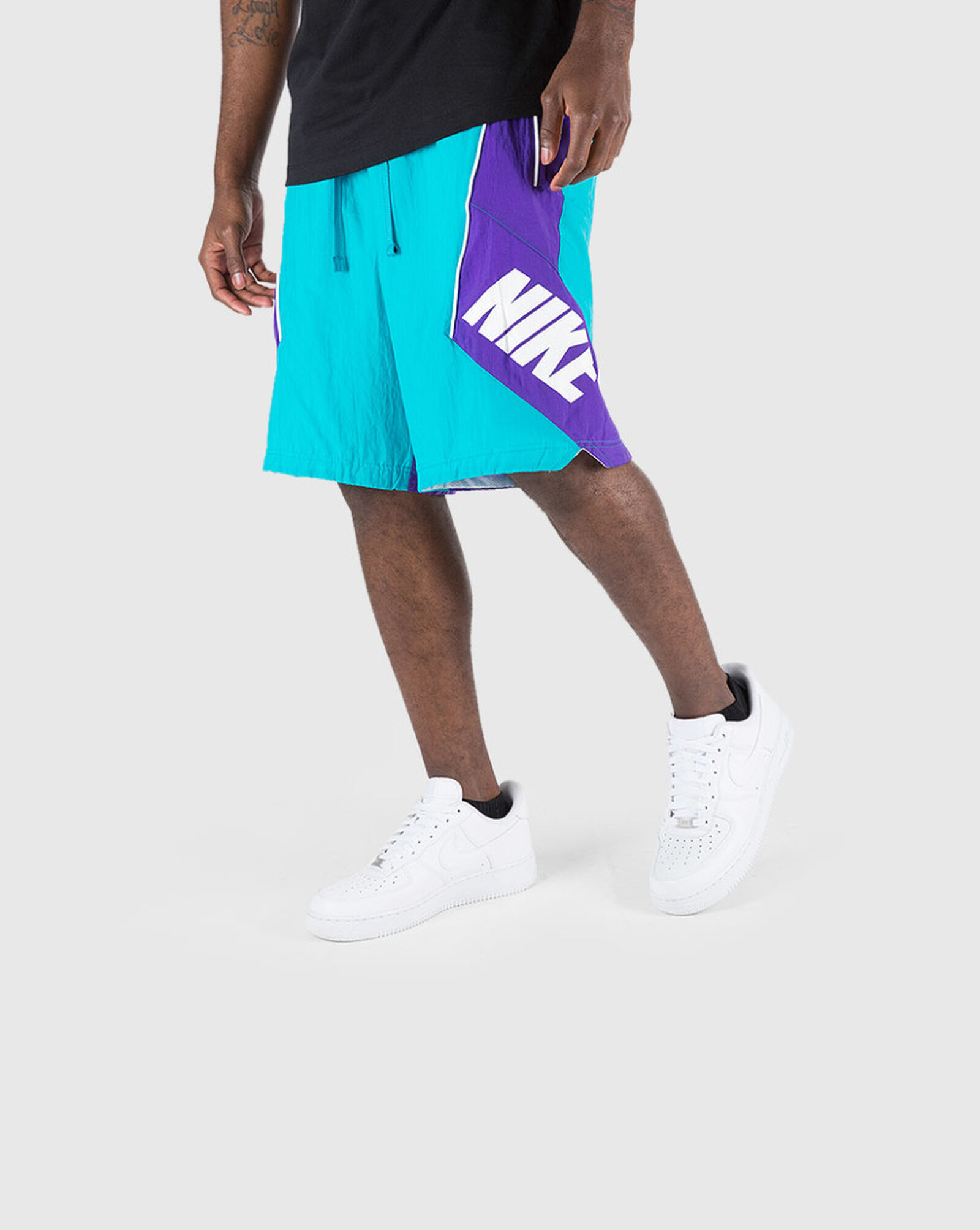 teal and purple nike shorts