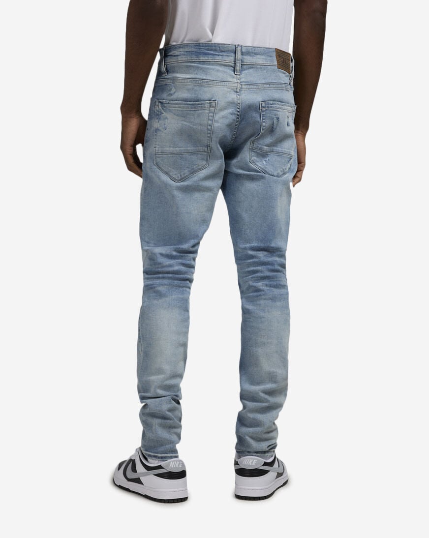 Shop Jordan Craig Slim Distressed 5-Pocket Jeans JS2103-SEA blue