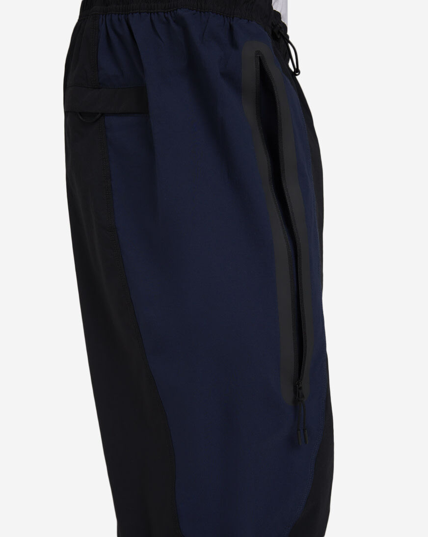 Shop Nike Tech Dri-FIT Woven Color-Block Oversized Pants IH8466