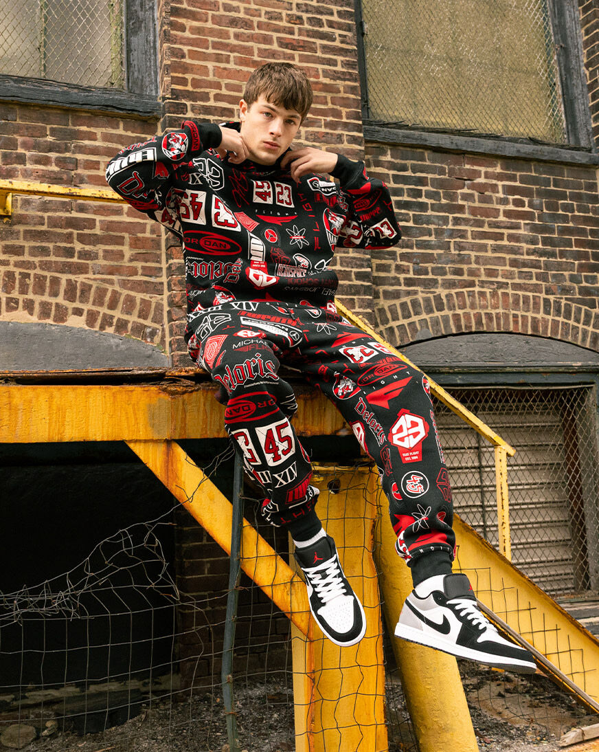Shop Jordan Brooklyn Essentials AOP Logo Hoodie HM7254-010 black