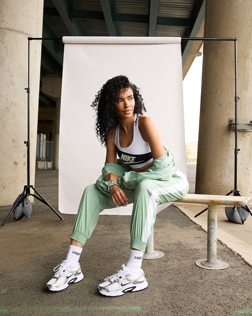Shop Nike NSW Classic Wovens UV Protection Mid-Rise Loose Joggers