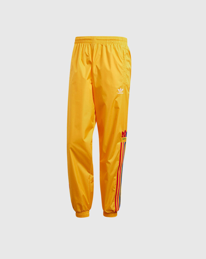 Adidas pants with best sale yellow stripes