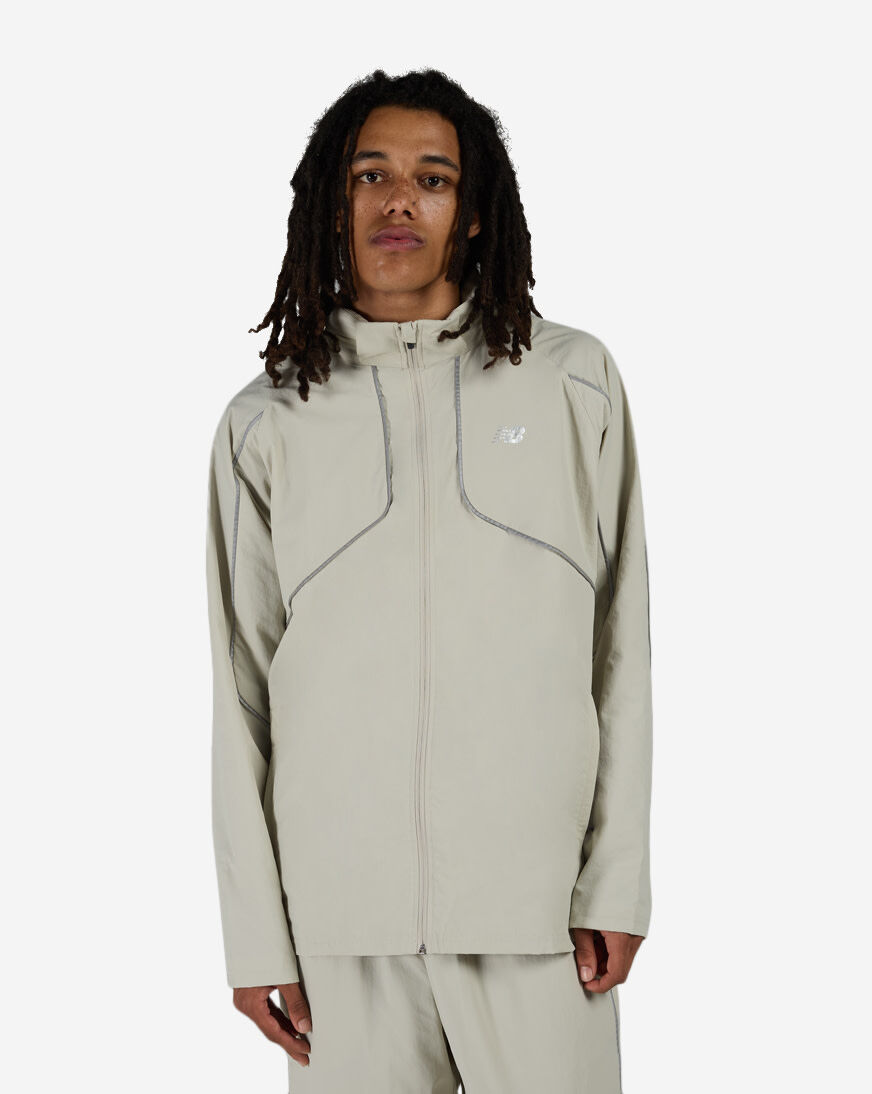 Shop New Balance Reflective Woven Jacket MJ61E2BY-SHY beige