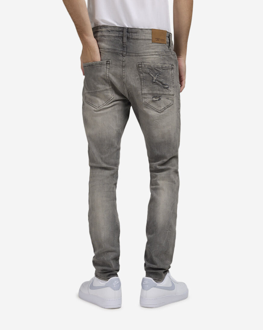Shop Jordan Craig 5Pkt Rip Repair Jeans JS3208-GRY grey | SNIPES USA