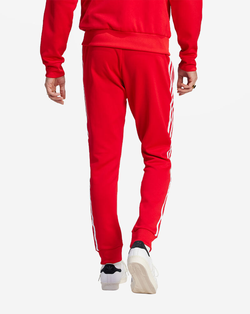 Shop adidas SST Track Pants IM4543 red