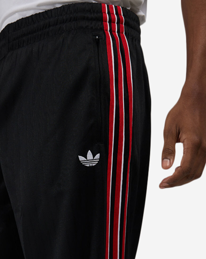 Shop adidas Firebird Loose Pinstripes Track Pants KE3457 black