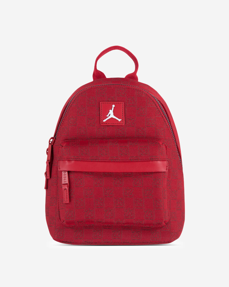jordan monogram mini backpack red zipper closure Smaller zippered front compartment Padded shoulder straps Top haul loop Metallic details Number 23 allover print The Jordan Monogram Backpack is imported Jordan Monogram Backpack Review |