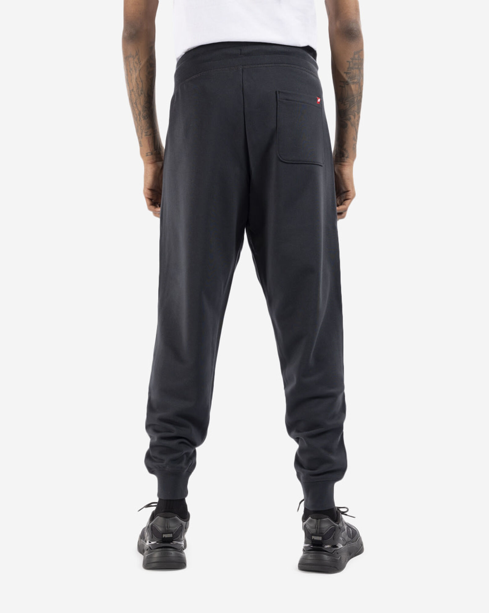 Shop New Balance Essentials Stacked Logo Sweatpants MP03558BK black