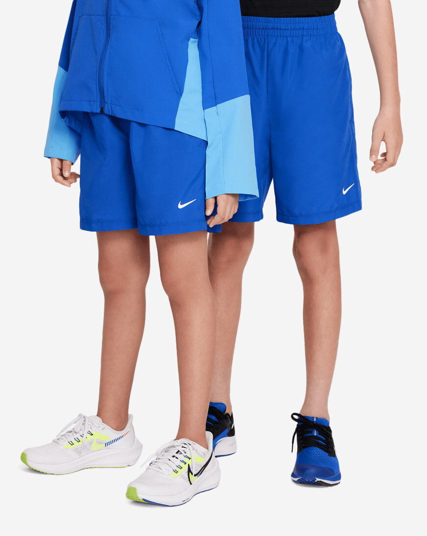 Shop Nike Big Kids' NSW Dri-Fit Woven Shorts DX5382-480 blue