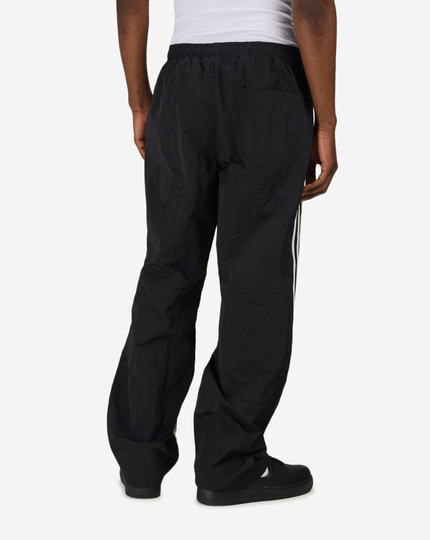 Shop Decibel Vertical Stripe Nylon Pants FW26B6201-BLK black