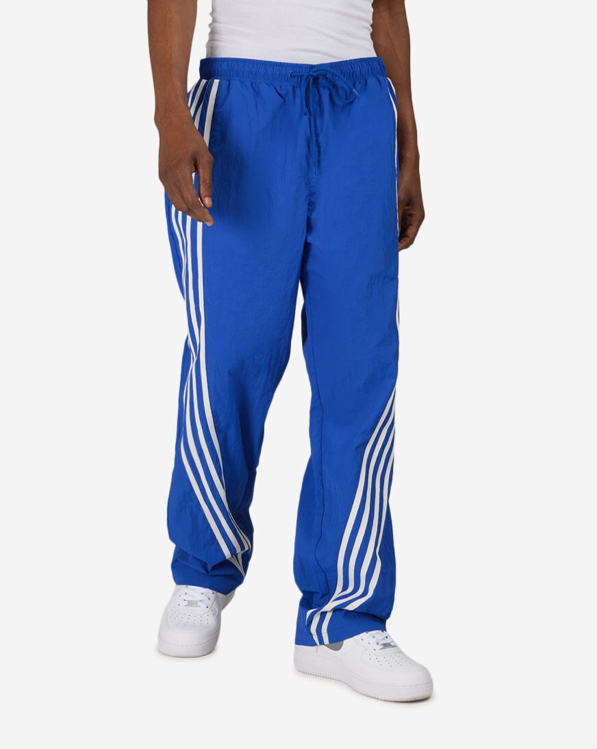Shop Decibel Vertical Stripe Nylon Pants FW26B6201-BLU blue