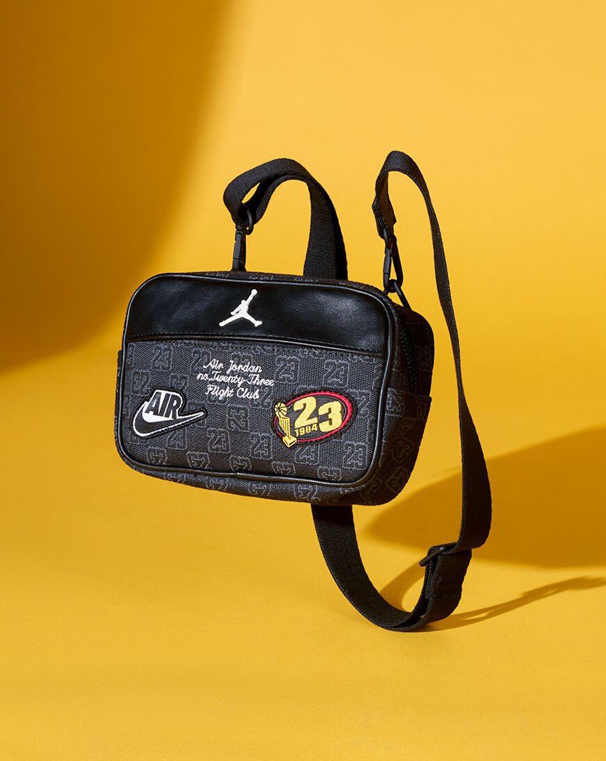 Shop Jordan JAM Monogram Camera Bag MA9159-023 black | SNIPES USA