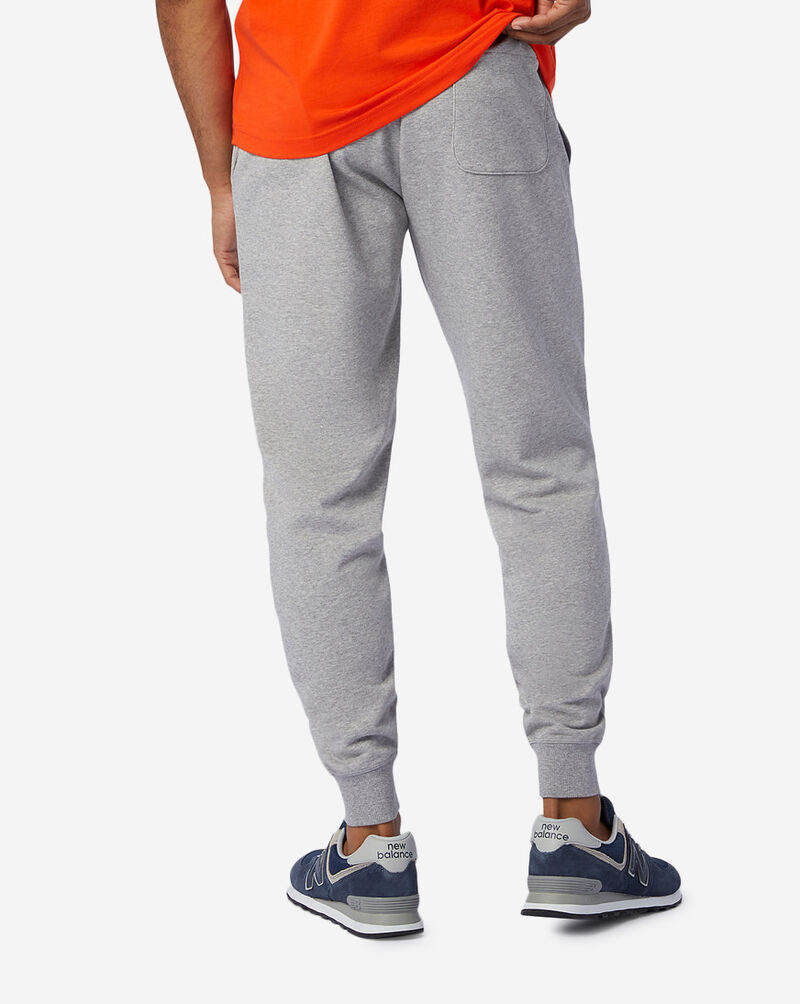 Shop New Balance Essential Stacked Logo Sweatpants MP03558AG grey