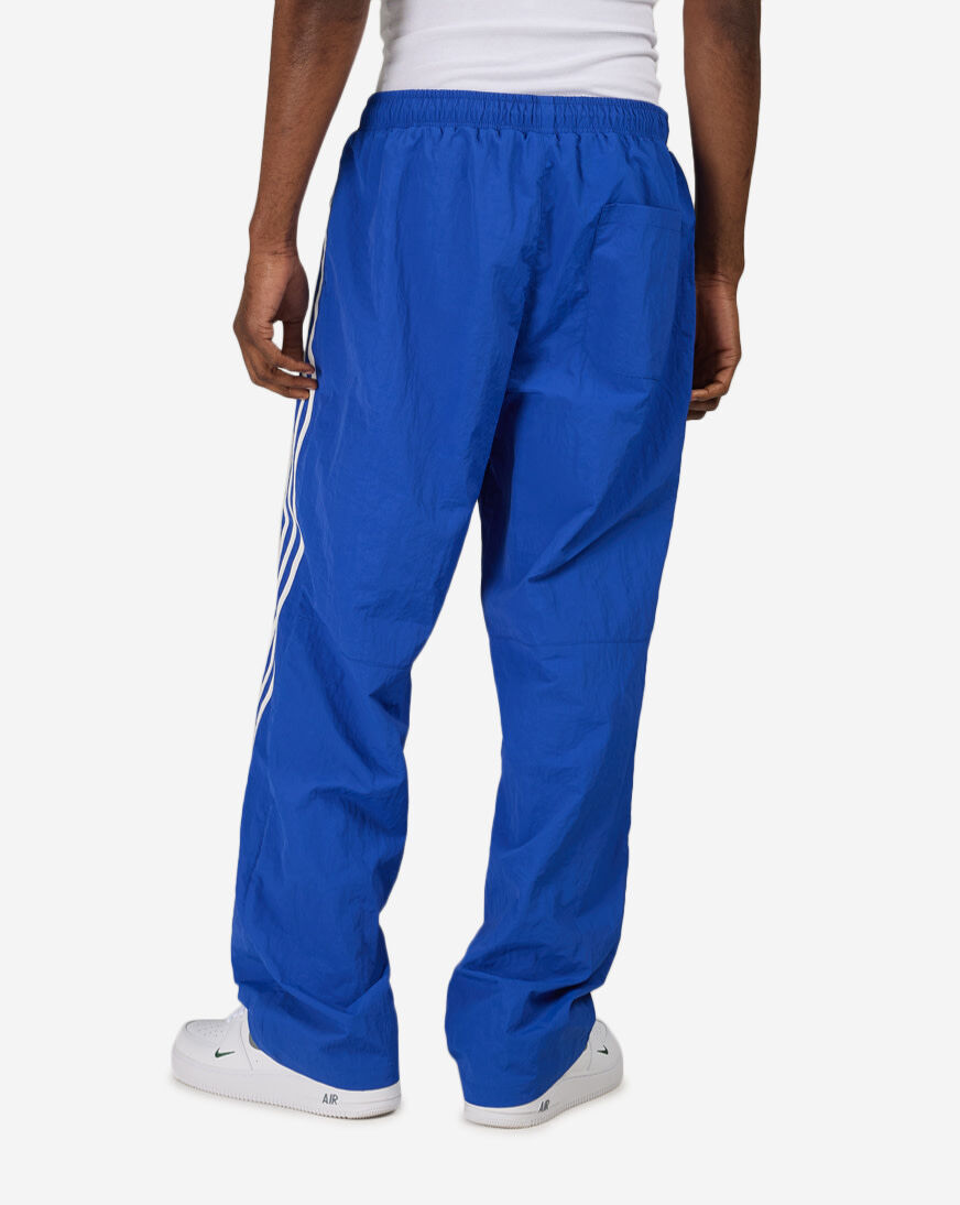 Shop Decibel Vertical Stripe Nylon Pants FW26B6201-BLU blue