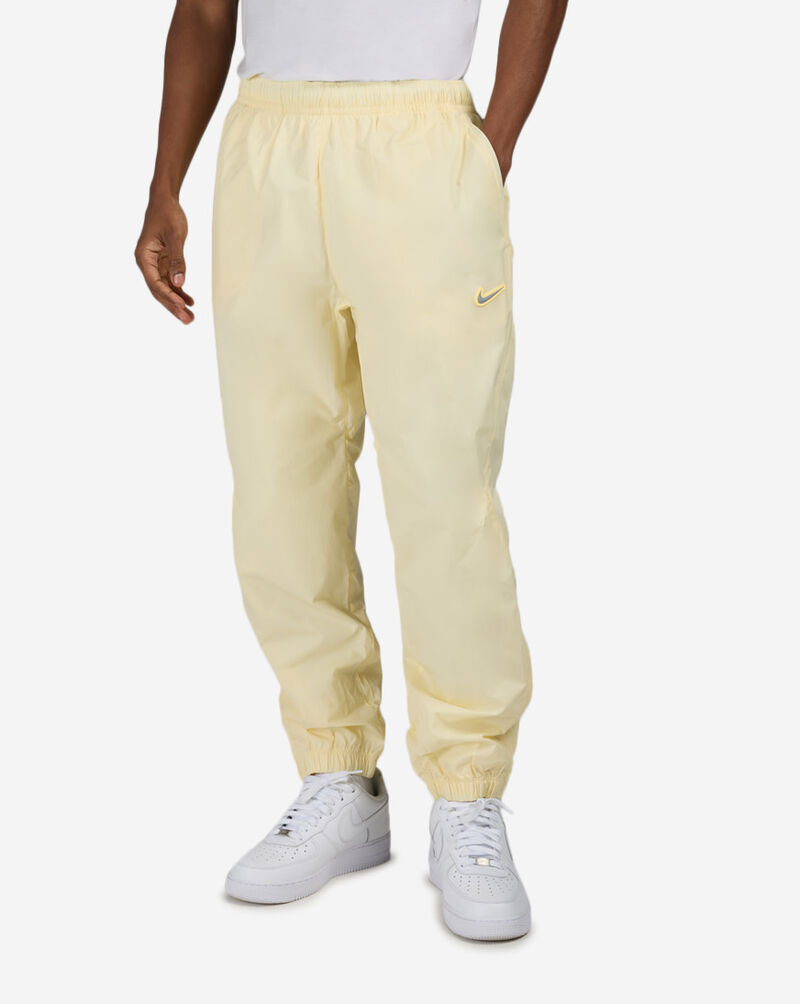 Nike NOCTA Northstar Nylon Track Pants FN7668-744 Yellow 1