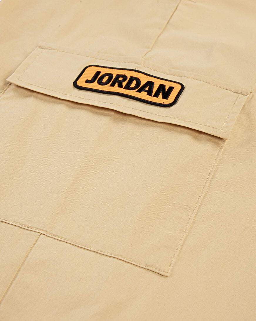 Shop Jordan Big Kids' Deep Dish Woven Pants 95F190-X21 beige
