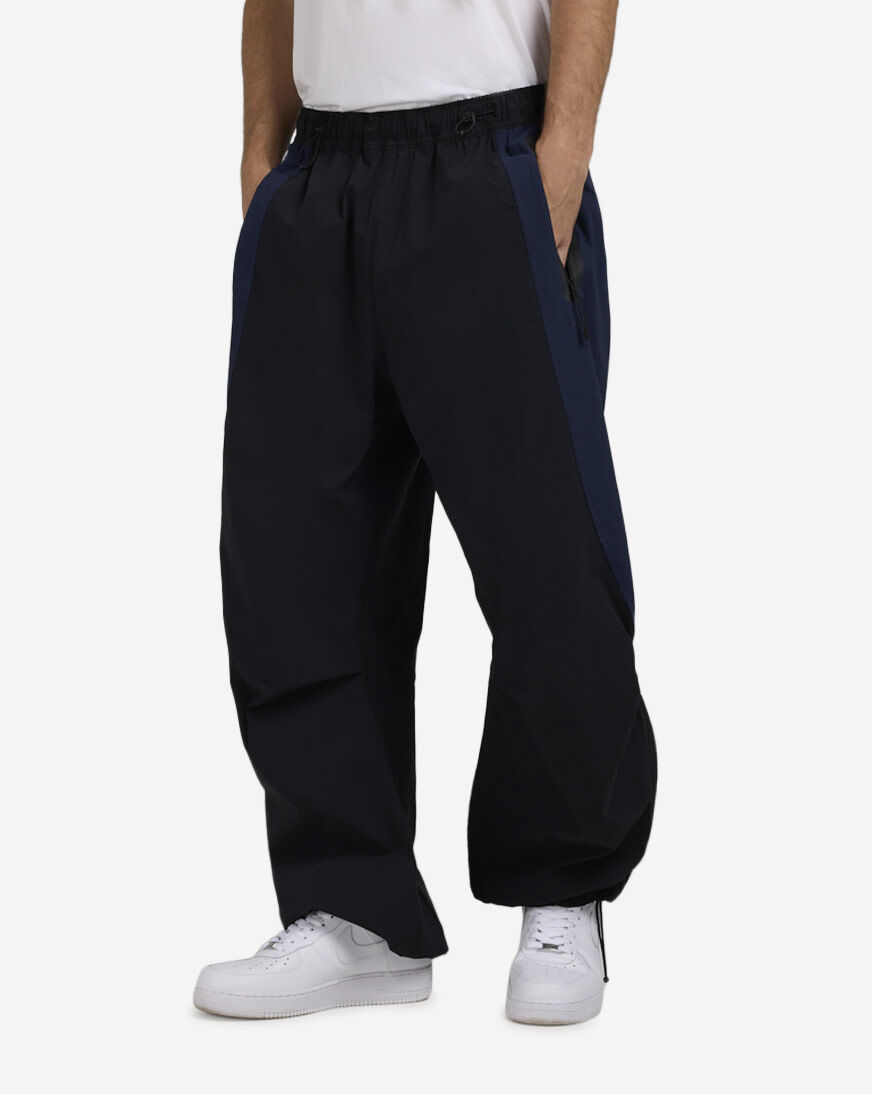 Shop Nike Tech Dri-FIT Woven Color-Block Oversized Pants