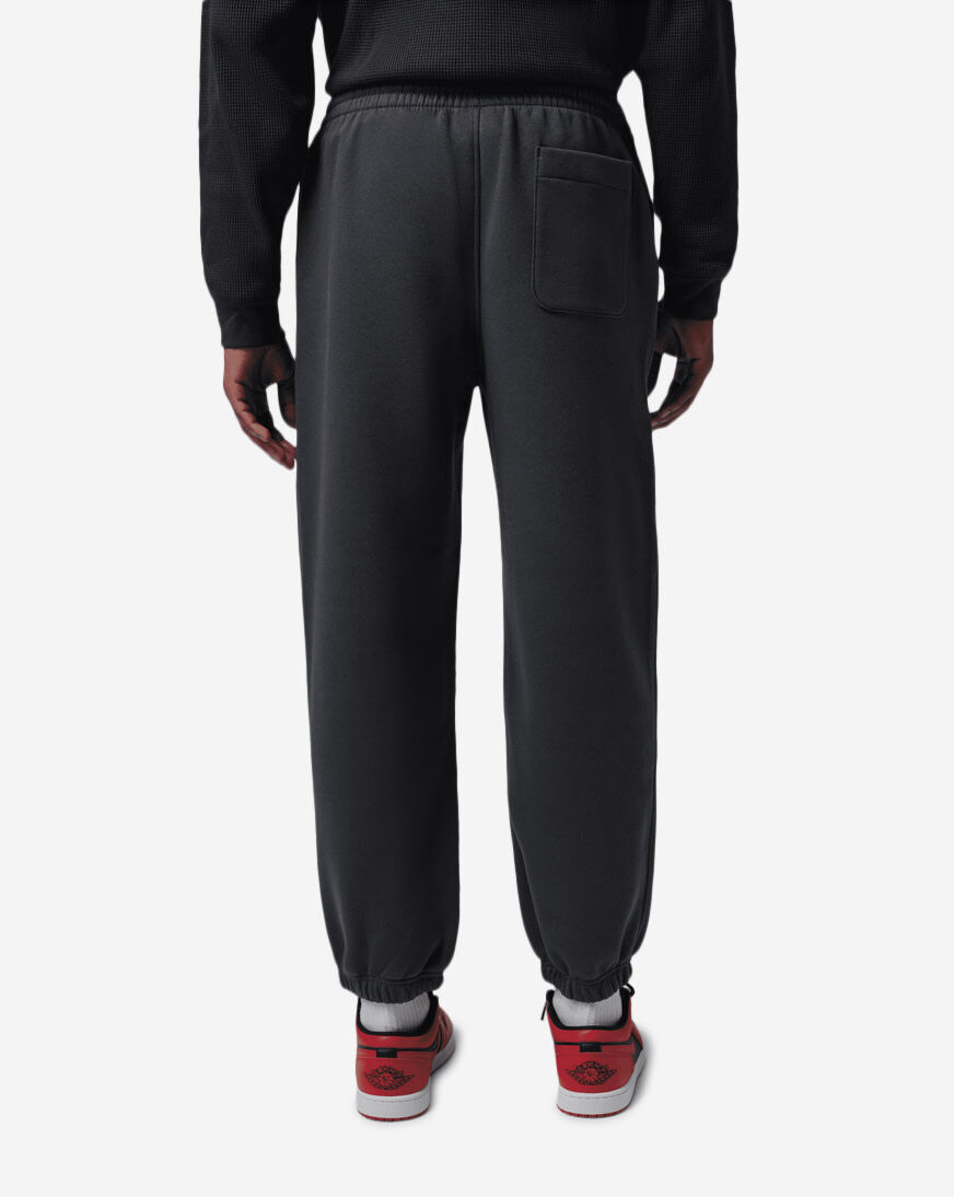 Shop Jordan Brooklyn Fleece Cuffed Pants IW1060-045 black | SNIPES USA