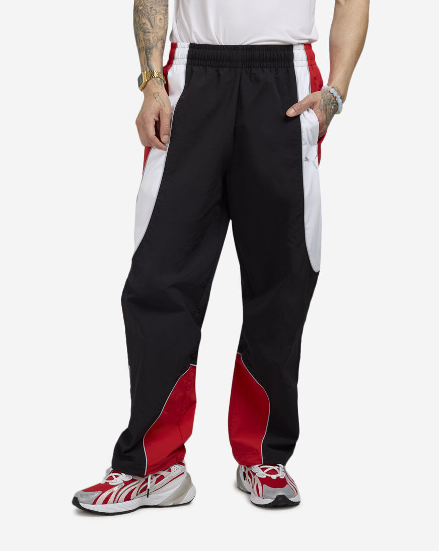 Shop Puma PUMATECH-X Colorblock Relaxed Track Pant 63434701 black