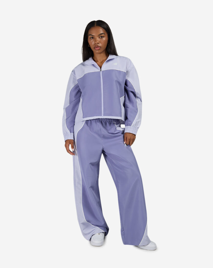 Shop New Balance Trackside Woven Pant WB62O9UF_DSV purple | SNIPES USA