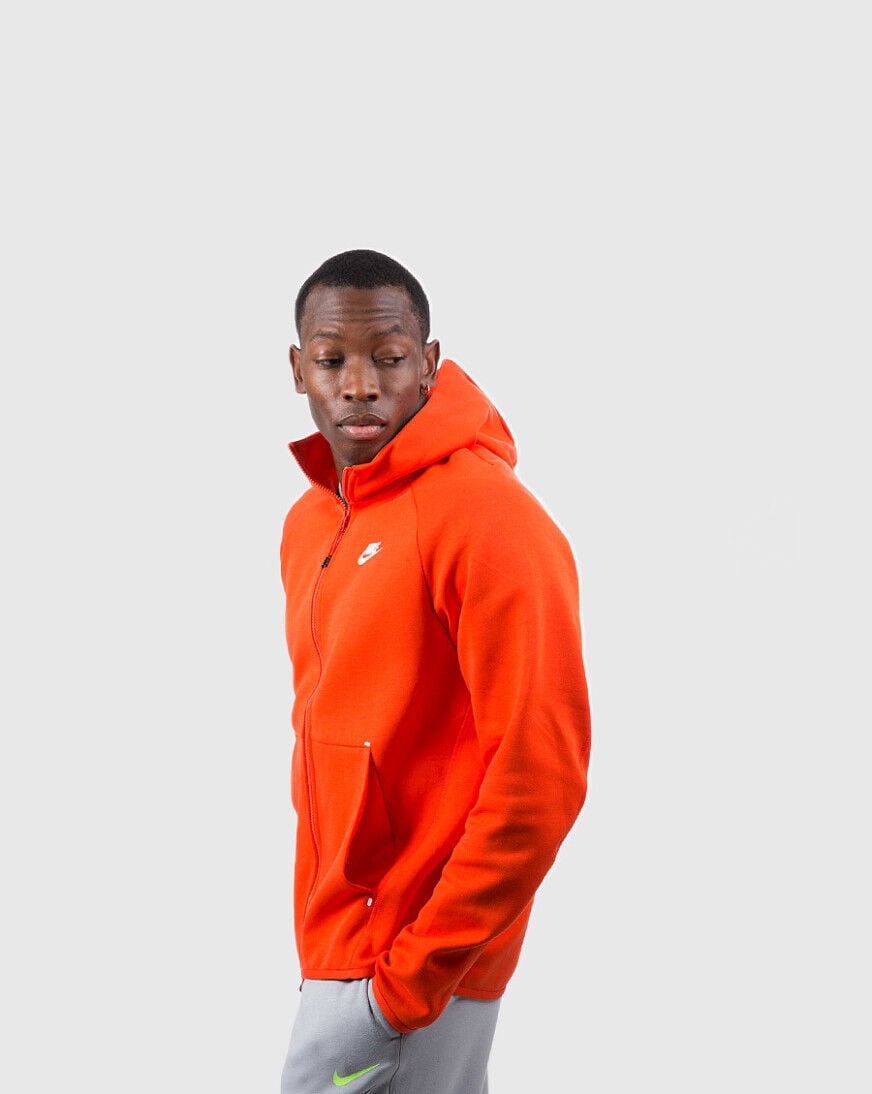 orange nike tech sweatsuit