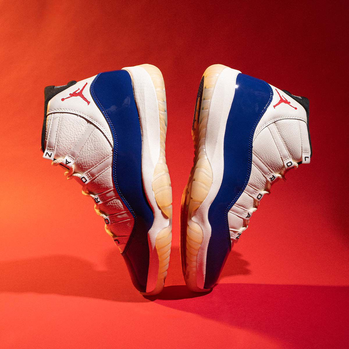 blue and orange jordan 11