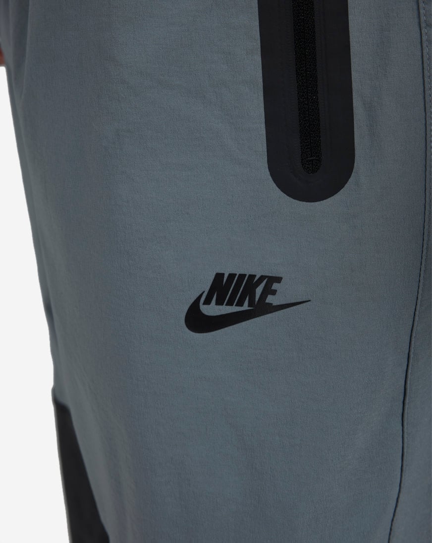 Shop Nike Tech Woven Oversized Pants HM7158-065 grey | SNIPES USA