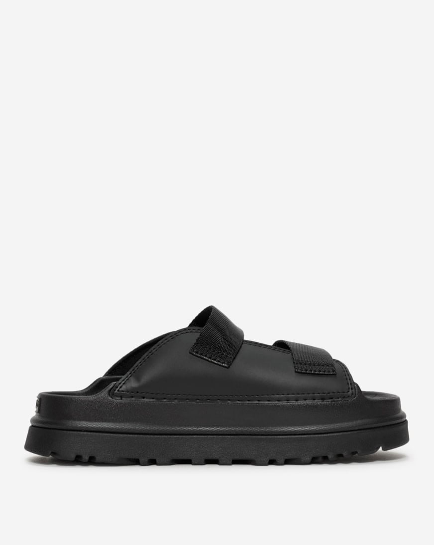 Shop UGG Grade School GoldenGlow Slide 1166513BLKJ black | SNIPES USA