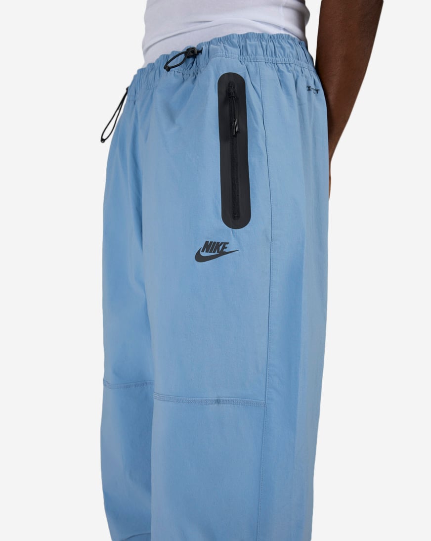 Shop Nike Tech Dri-FIT Woven Pants IU6966-486 blue | SNIPES USA