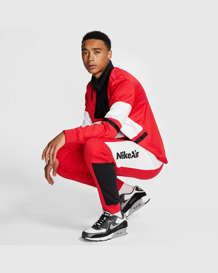 university red nike joggers