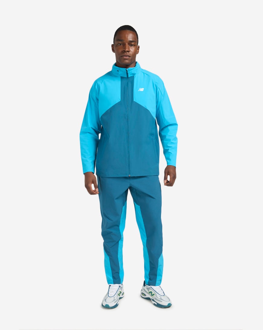 Shop New Balance Utility Stretch Woven Pant MB62Q2P6-ATD blue