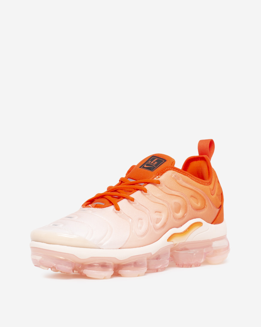 orange and pink vapormax plus