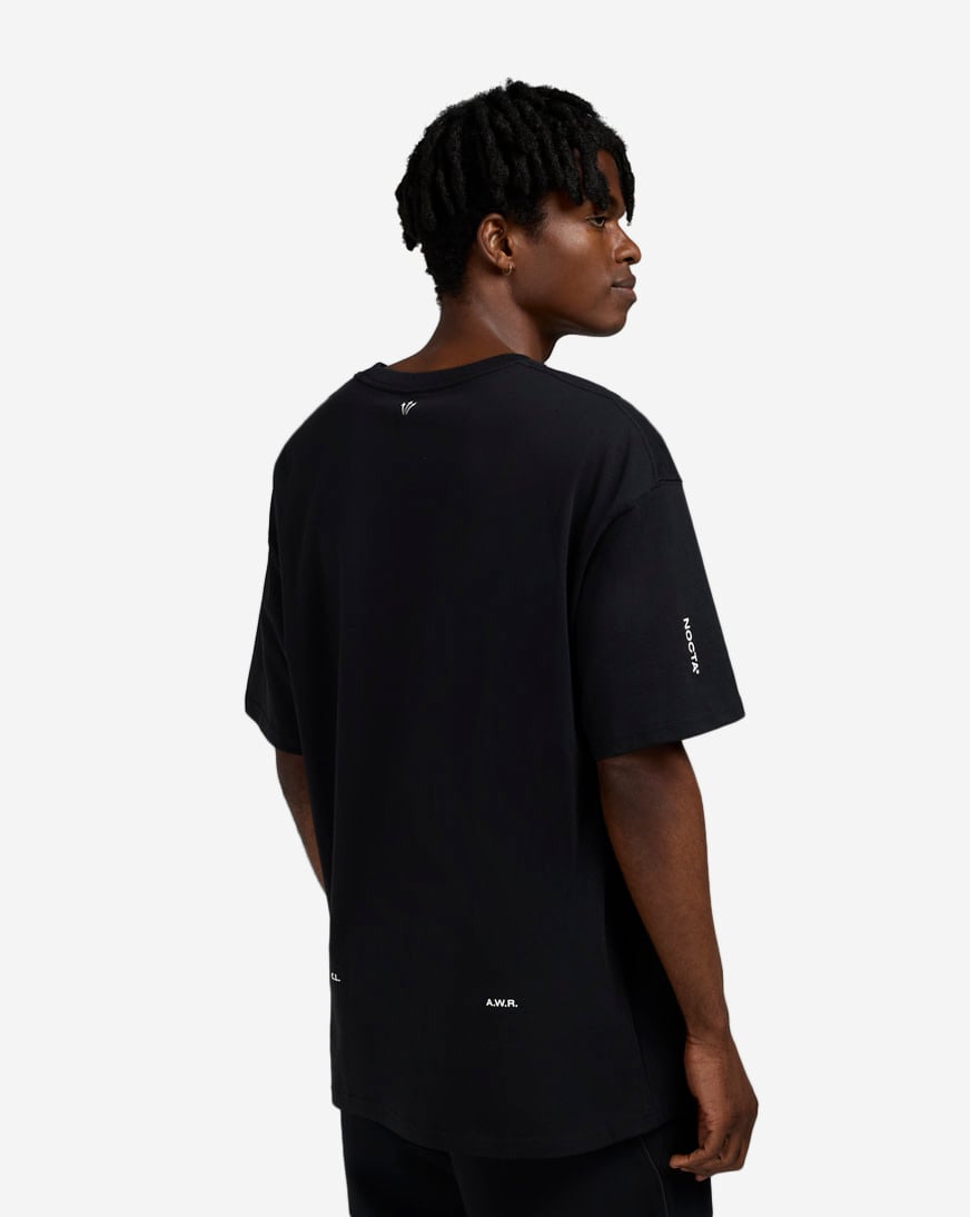 Shop Nike NOCTA NRG CS Tee HM5774-010 black | SNIPES USA