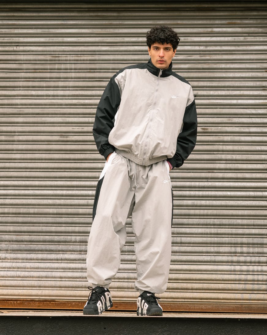 Shop Nike Club Woven Track Jacket HQ6109-077 grey | SNIPES USA