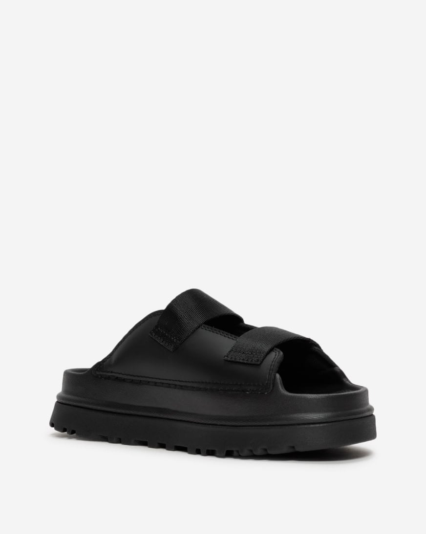 Shop UGG Grade School GoldenGlow Slide 1166513BLKJ black | SNIPES USA