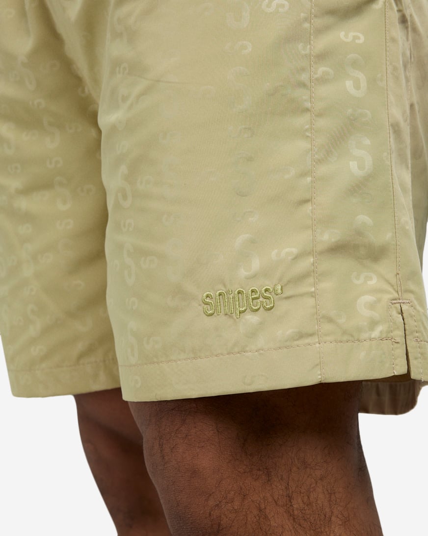 Shop SNIPES Logo Repeat Nylon Shorts SNQ225003M-KHA beige