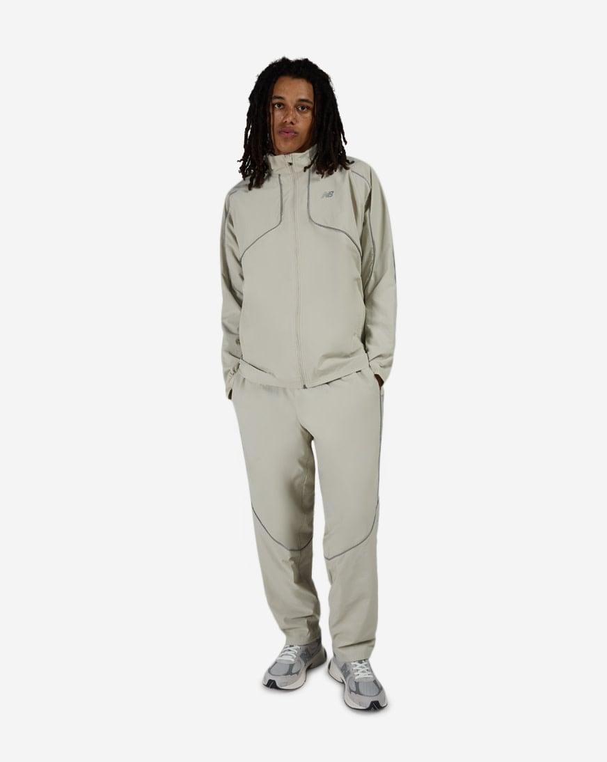 Shop New Balance Reflective Woven Jacket MJ61E2BY-SHY beige