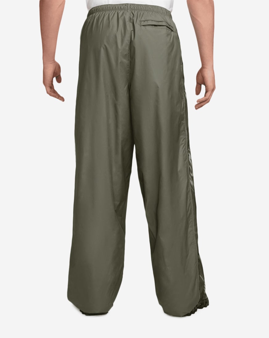 Shop Nike Graphic Track Pants IO1736-222 green | SNIPES USA