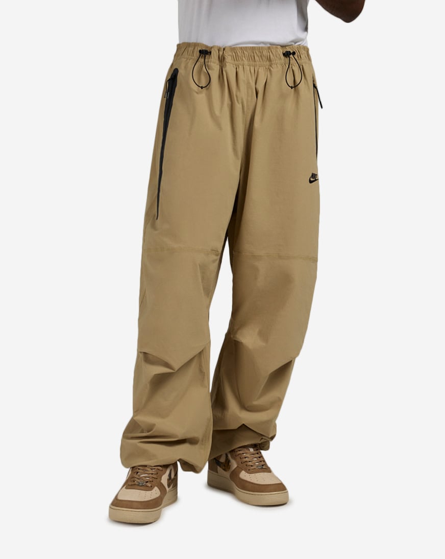 Shop Nike Tech Dri-FIT Woven Color-Block Oversized Pants HM7158