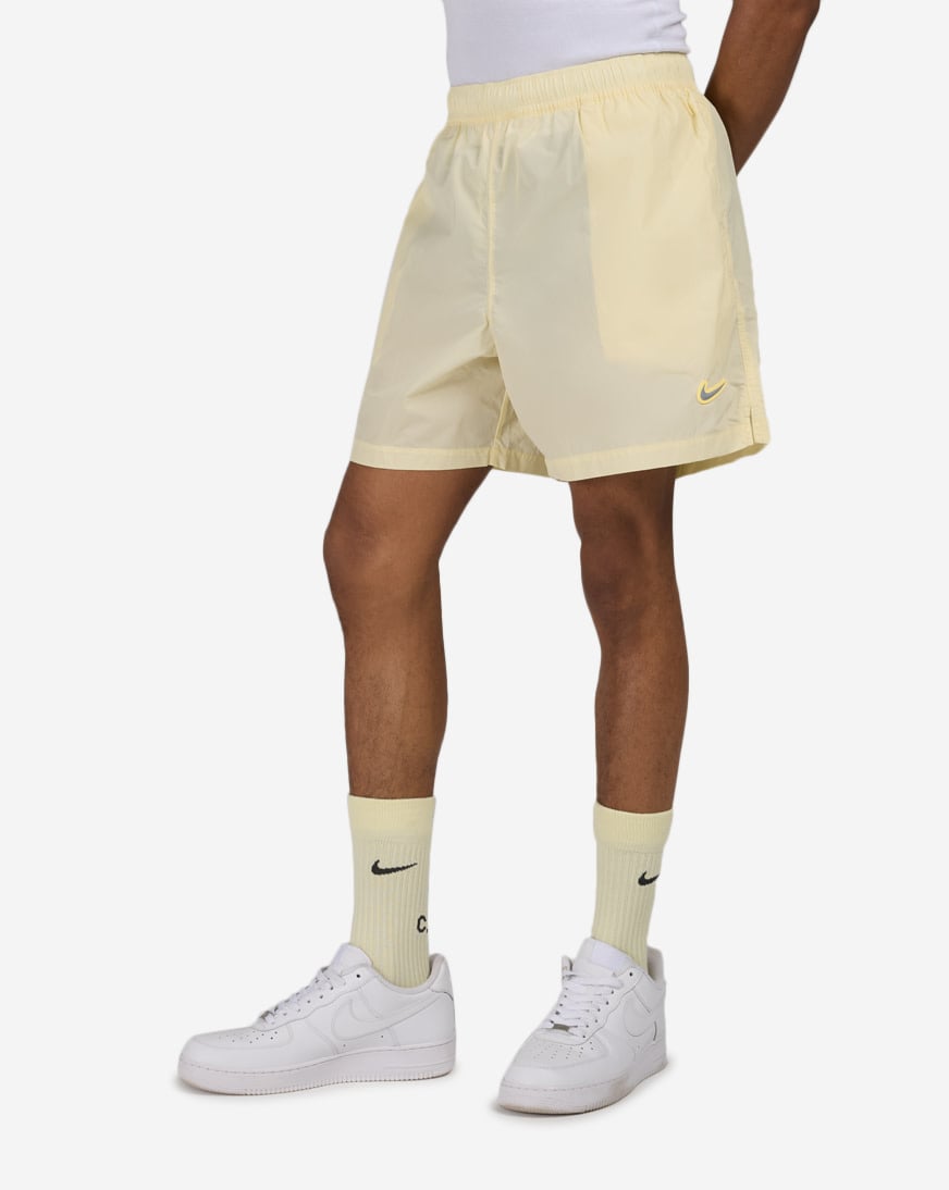 Shop Nike NOCTA Cardinal Nylon Shorts FN8194-744 yellow | SNIPES USA