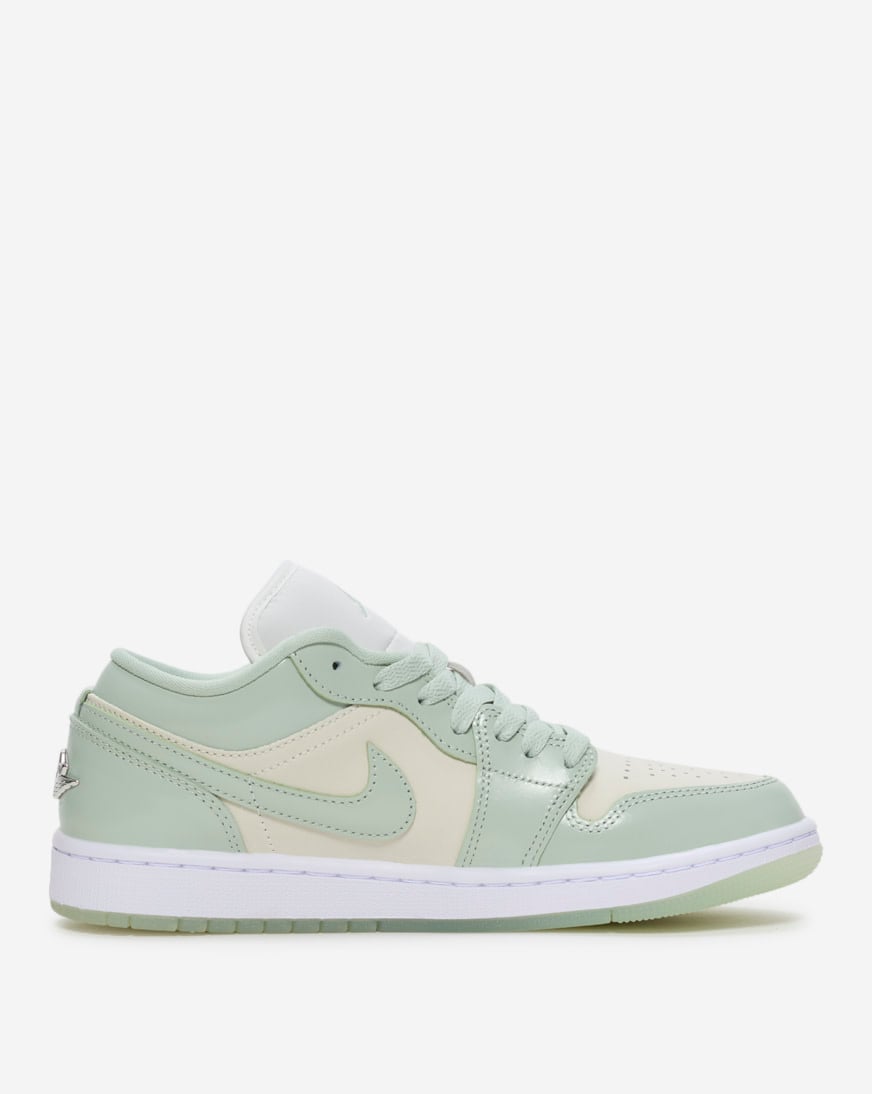 green and white low top jordans