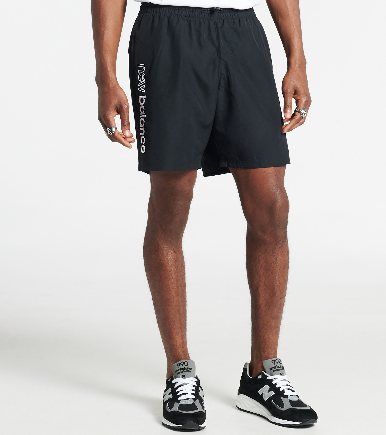 Shop New Balance Nylon Wind Shorts MS01511-BK black | SNIPES