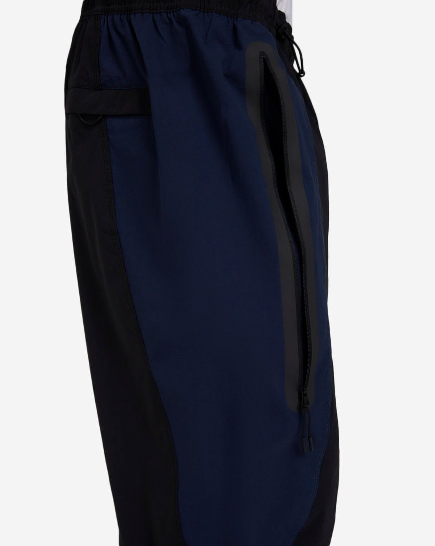 Shop Nike Tech Dri-FIT Woven Color-Block Oversized Pants IH8466