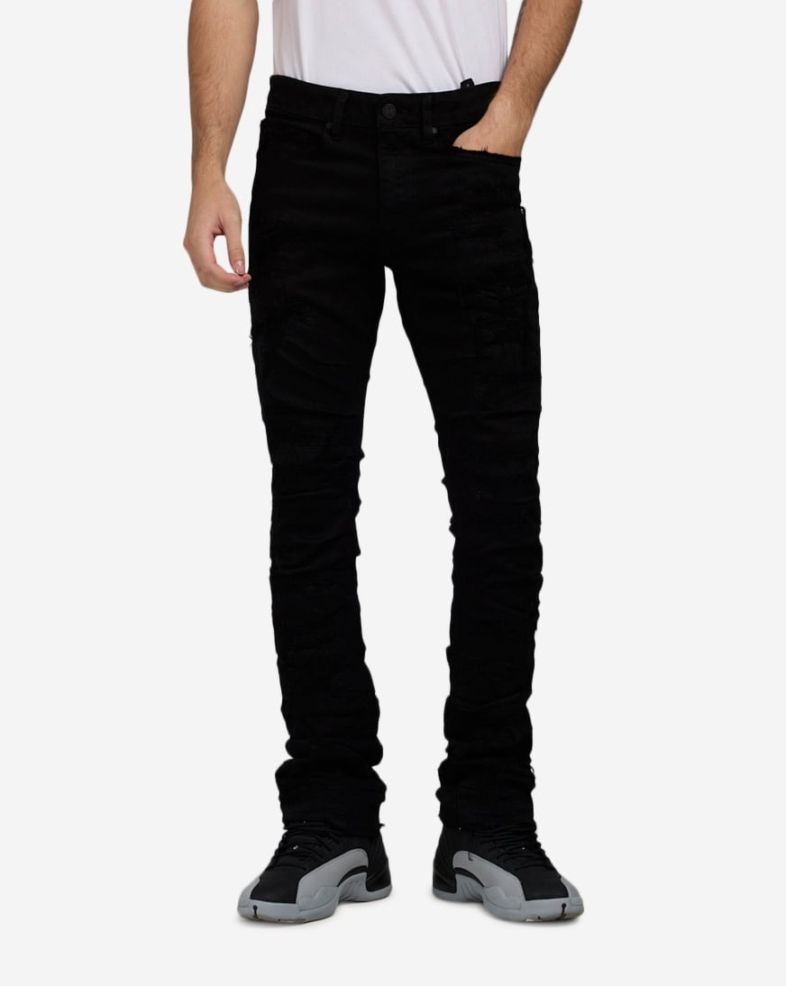 Shop Jordan Craig Distressed Rip Repair Stacked Jeans JTF2257A-BLK
