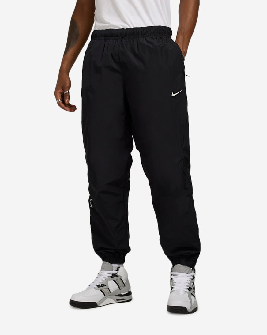Shop Nike NOCTA Northstar Nylon Track Pants FN7668-010 black