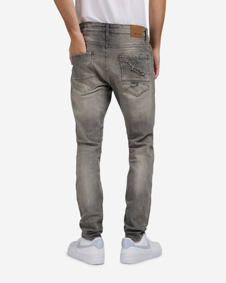 Shop Jordan Craig 5Pkt Rip Repair Jeans JS3208-GRY grey | SNIPES USA