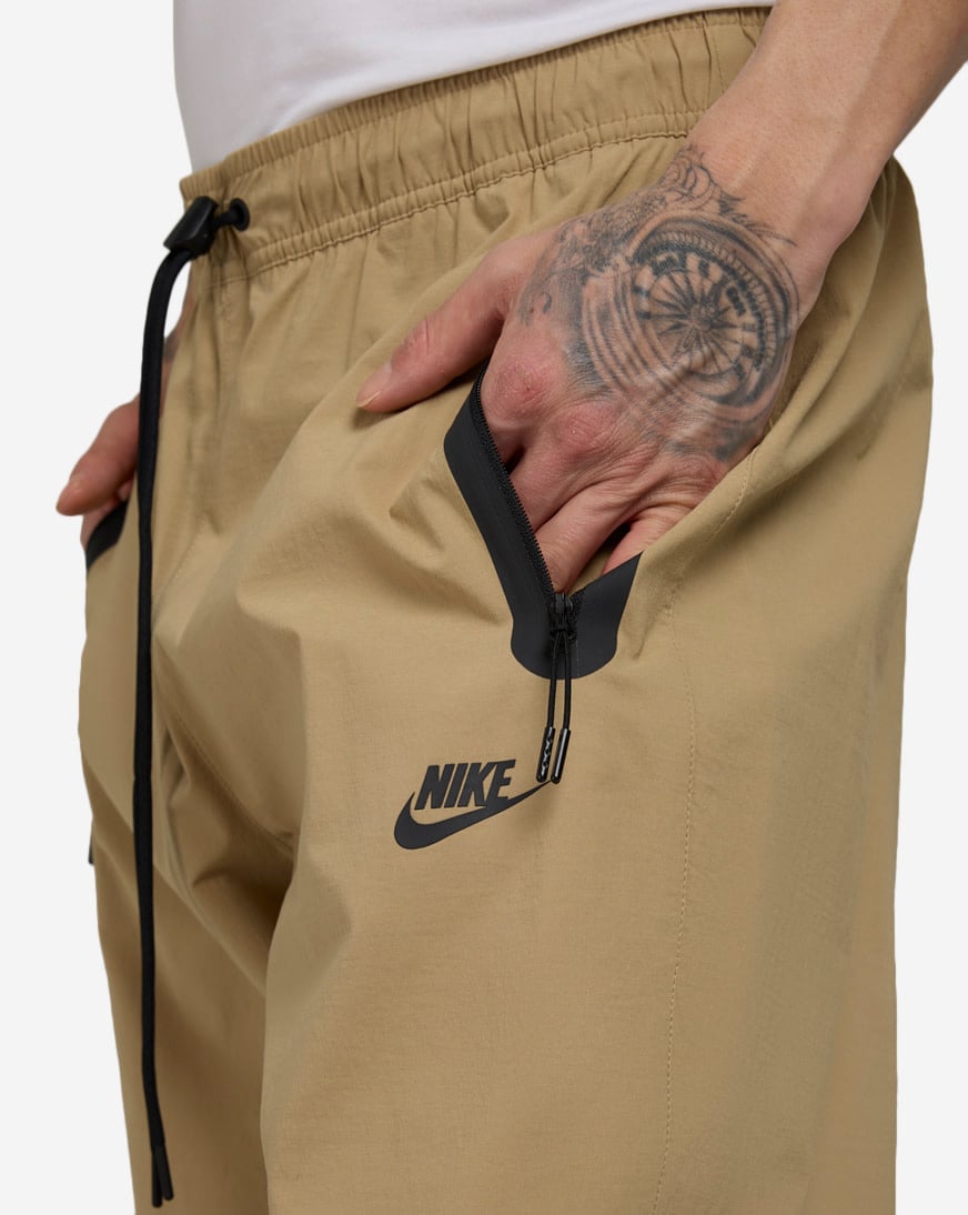 Shop Nike Tech Woven Pants HM8241-297 beige | SNIPES USA